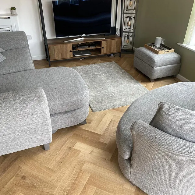 Invictus classic oak is a timeless colour fitted in a modern herringbone pattern