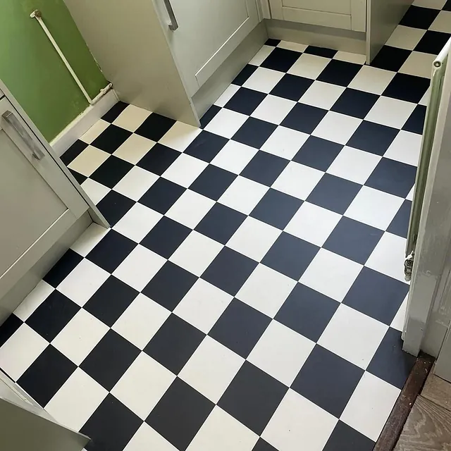 Chequer board cushion - floor vinyl