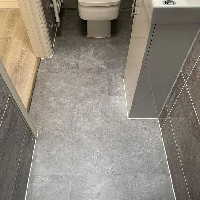 Bathroom downstairs toilet and en-suite all fitted with Unico Allura LVT click. A timeless quartz grey tile
