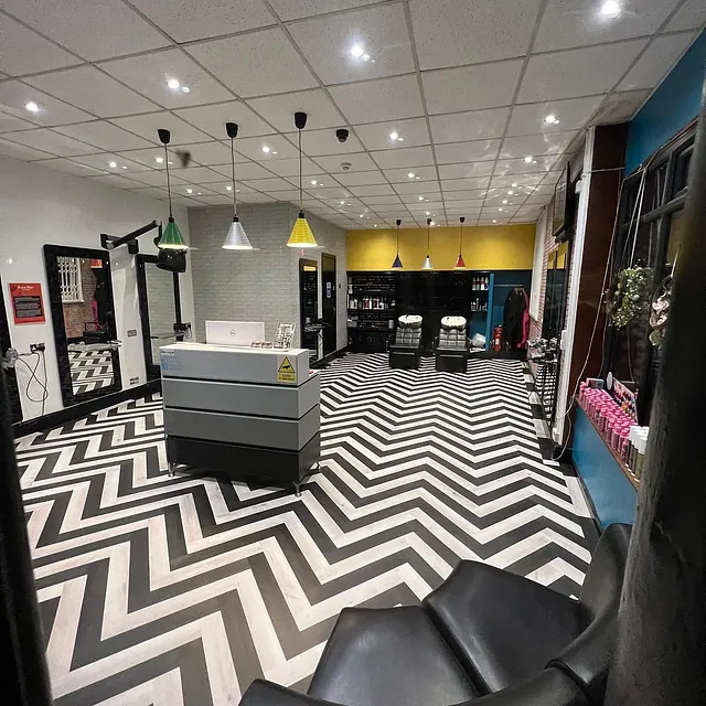 Black and white ALVA fitted in a herring bone LVT pattern
