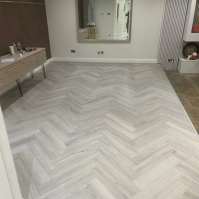 Herringbone flooring - Allora LVT click fitted in the clean Quartz Grey colour