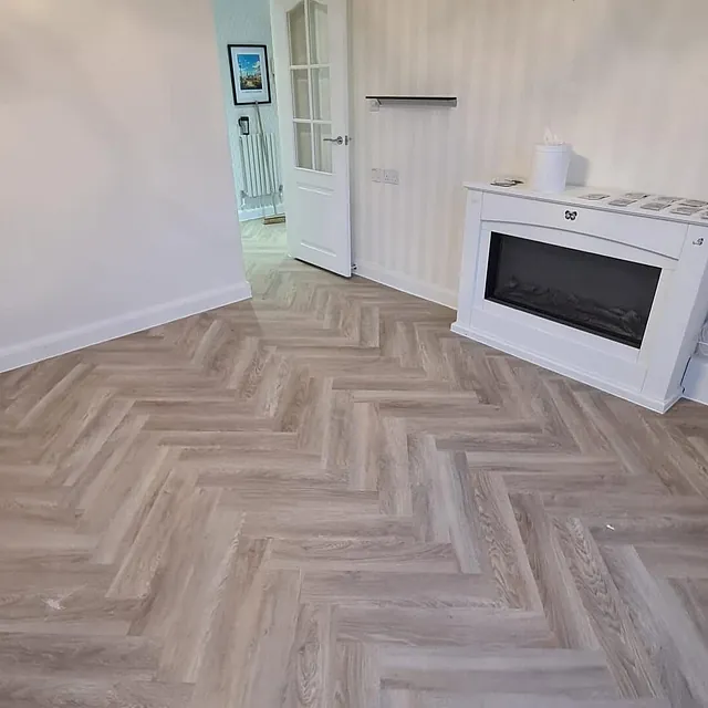 Sleek Bonnetto Herringbone laminate fitted in apartment in Sefton Park