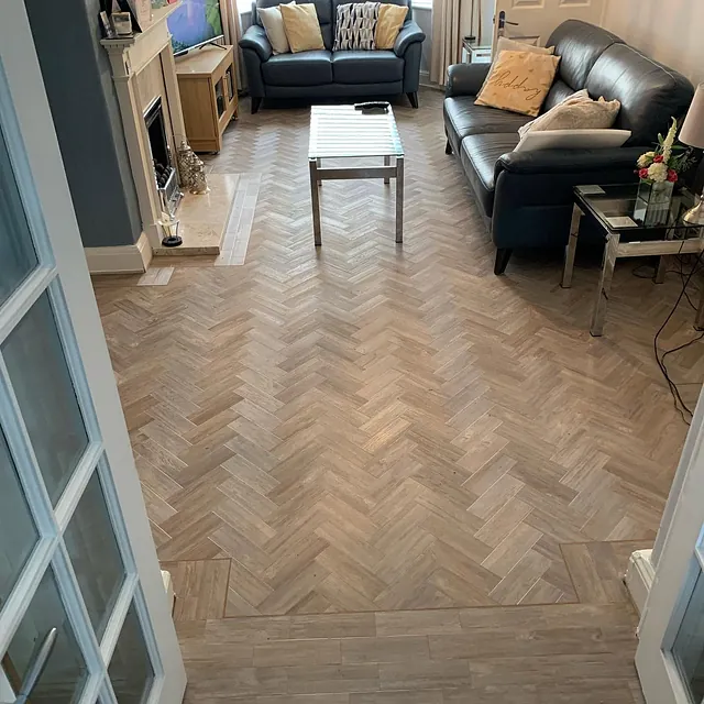 LVT throughout downstairs using LG colour Stonewash Birch in a classic Herringbone design