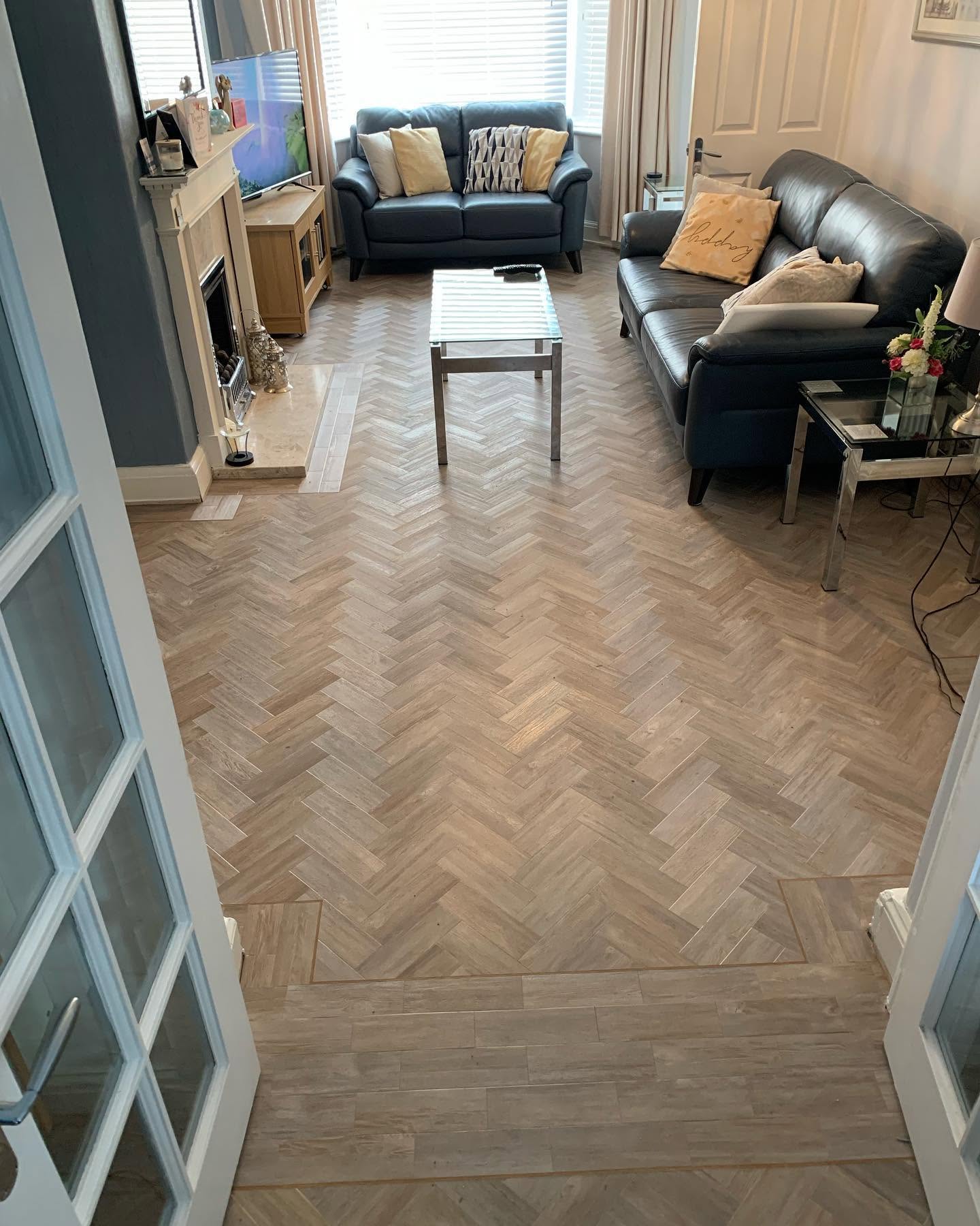 LVT throughout downstairs using LG colour Stonewash Birch in a classic Herringbone design