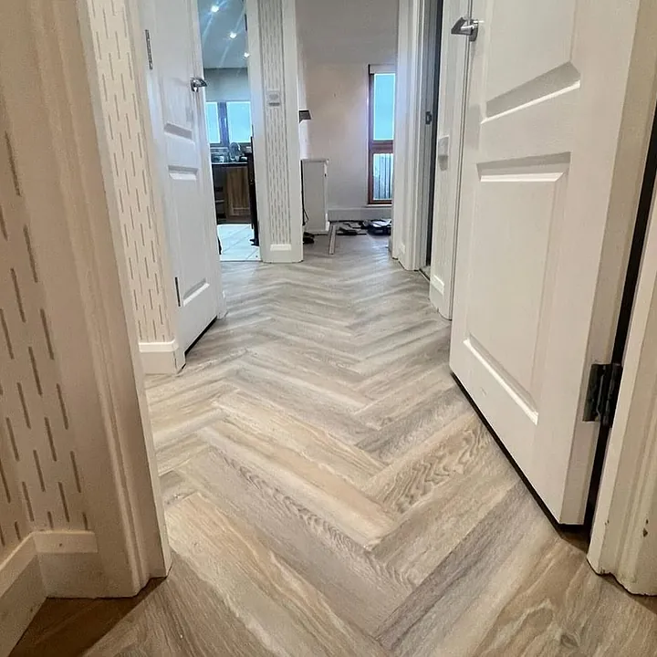Sefton Park apartment fitted in a sleek Bonnetto Herringbone laminate throughout
