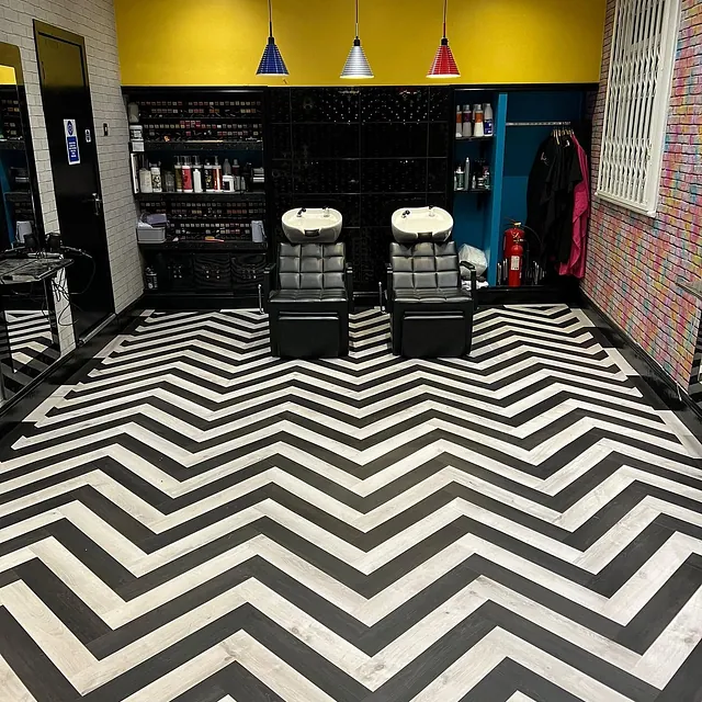 PandaChevron-Black and white ALVA fitted in a herringbone LVT pattern