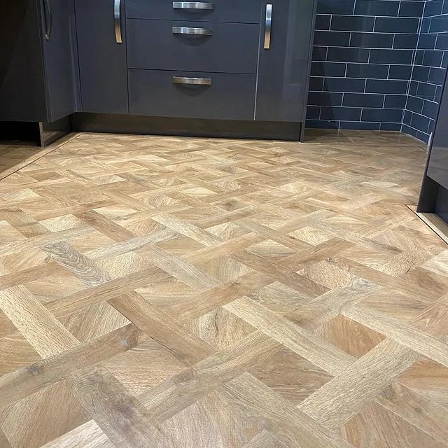 Kitchen fitted with Karndean Art Select Spring Oak fitted in an intricate basket weave pattern