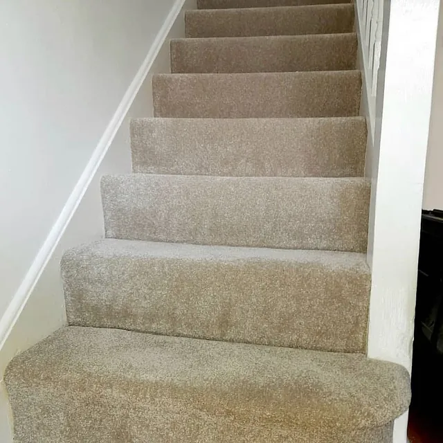 Stairs and landing fitted in a clean grey Cormar carpet